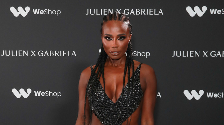 Lorraine Pascale posing in front of black backdrop