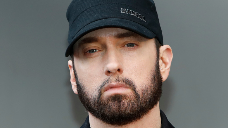 Eminem in black cap