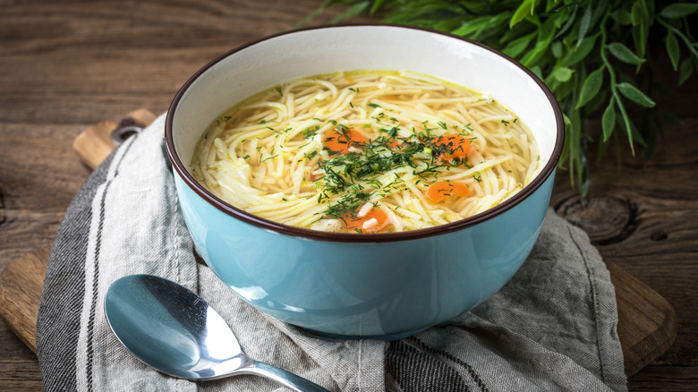 Bowl of soup with pasta noodles