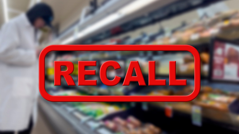 recall graphic over blurred image of grocery store freezer case