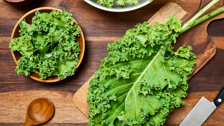 Kale in bowl and on cutting board