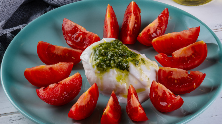 burrata topped with pesto