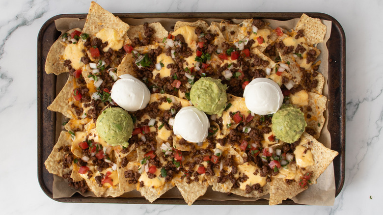 nachos in a baking pan