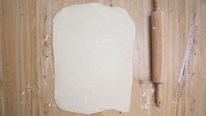 Dough rolled out on table