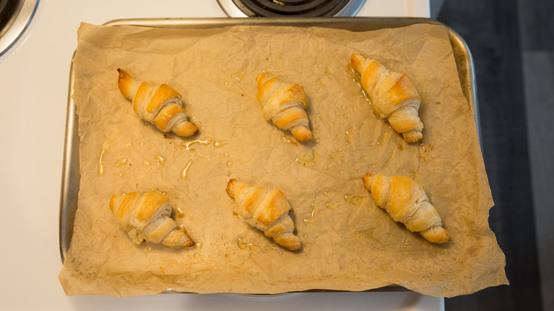 baked croissants on baking sheet