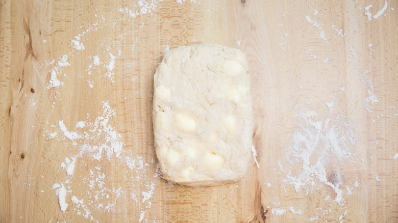 dough rectangle on wooden table