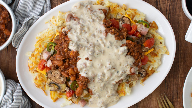 Copycat Waffle House All-the-Way Hash Browns on a serving platter