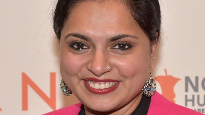 Close up of Maneet Chauhan smiling