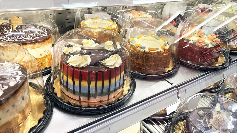 decorated cakes in a grocery store display