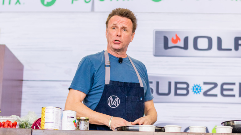 Marc Murphy talks at kitchen counter