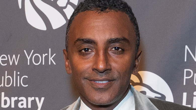 Marcus Samuelsson in suit on red carpet