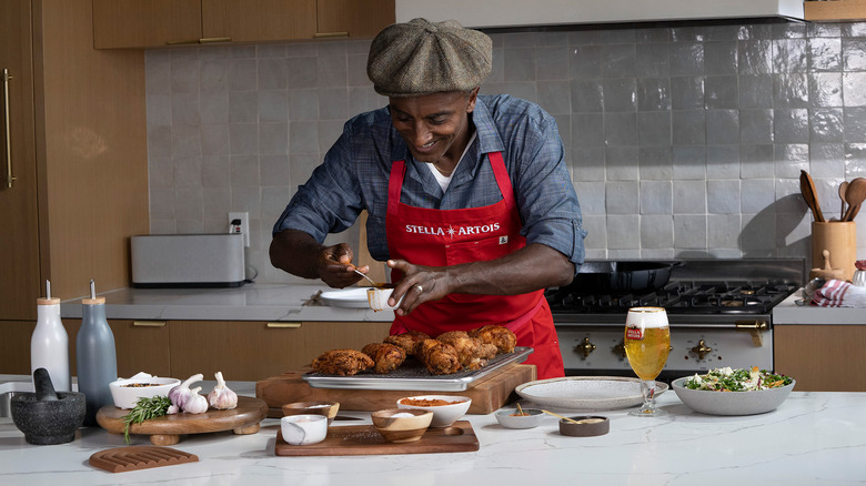 Chef Marcus Samuelsson cooking fried yardbird
