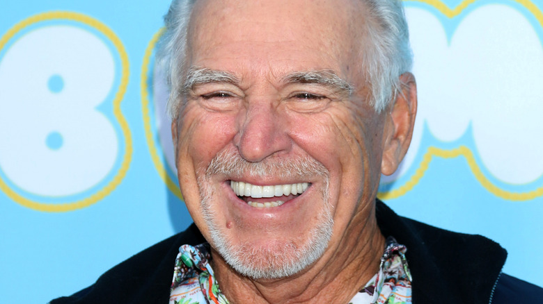 Jimmy Buffett open mouth smiling