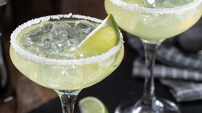 Margaritas with lime garnish