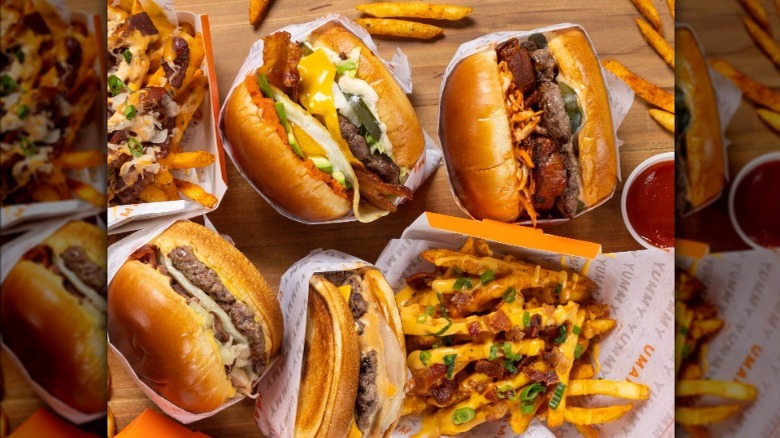 Assorted burgers and sides from Umami Burger