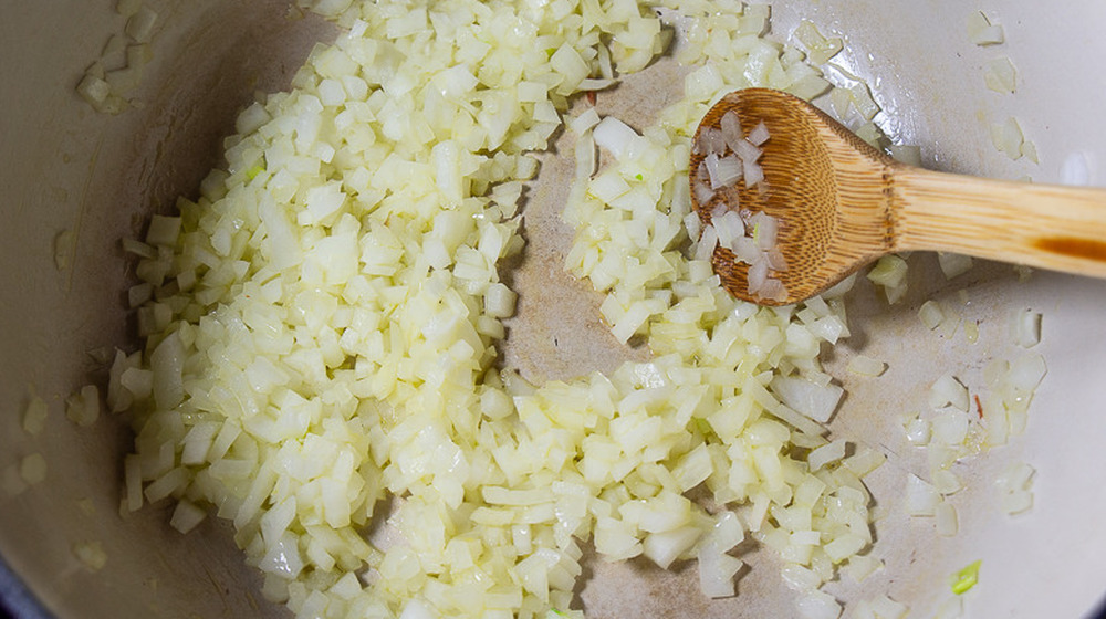 Pot of onions softening for marinara sauce