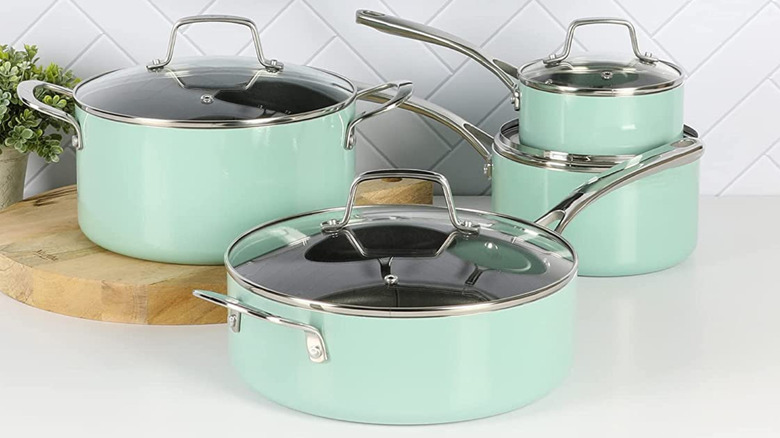 Teal-colored pots and pans