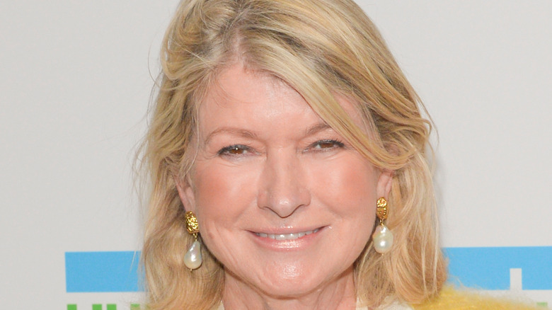 Martha Stewart in golden pearl earrings