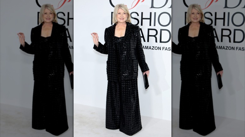 Martha Stewart wearing a black sequined jumpsuit and blazer by Dennis Basso