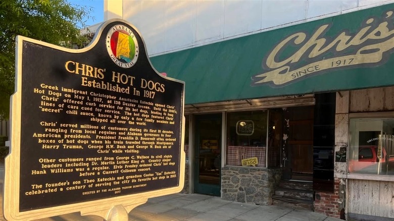 The exterior of Chris' Famous Hotdogs and its historical marker