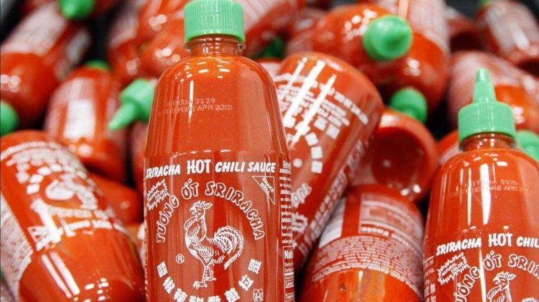 Bottles of sriracha hot sauce