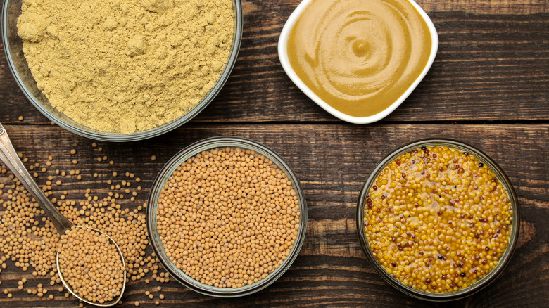 different types of mustard, including dry powder and mustard seeds
