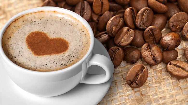 Coffee cup and coffee beans