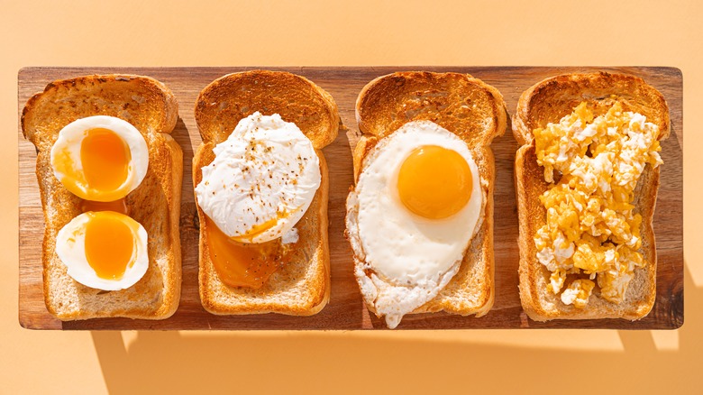 Various egg preparations on toast