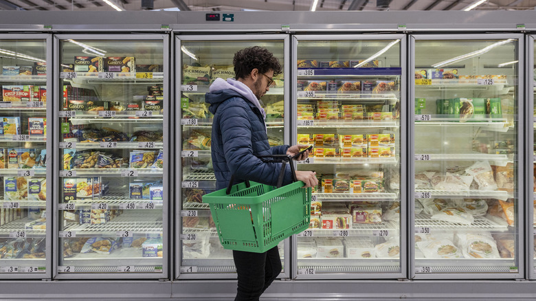 Man shopping at supermarket