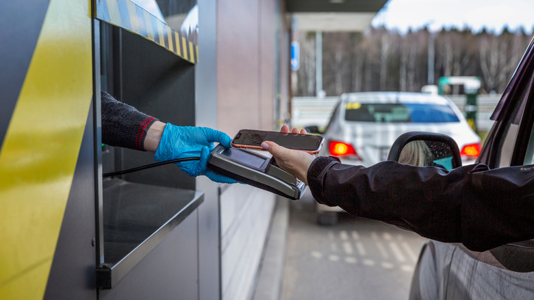 Drive thru payment at McDonald's