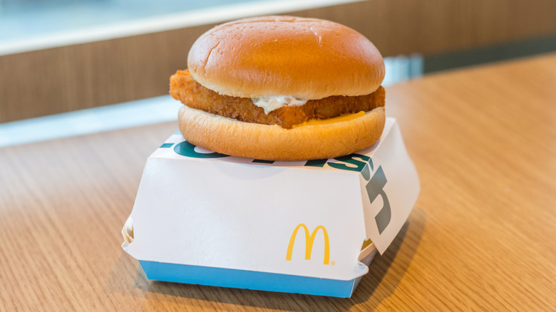McDonald's Filet-O-Fish sandwich sitting atop a branded box