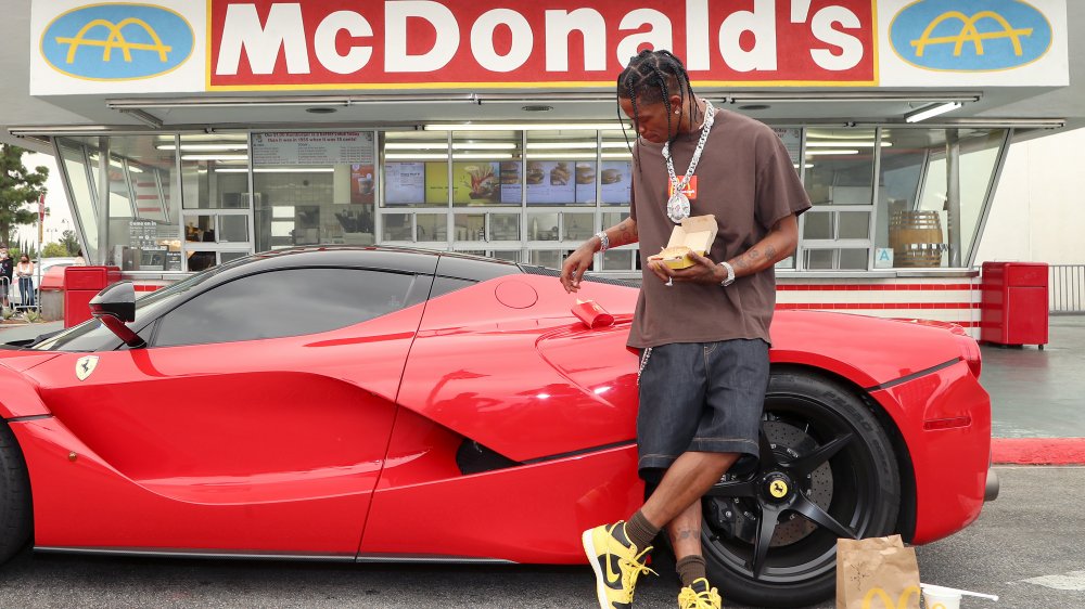 Travis Scott and his Ferrari at McDonald's