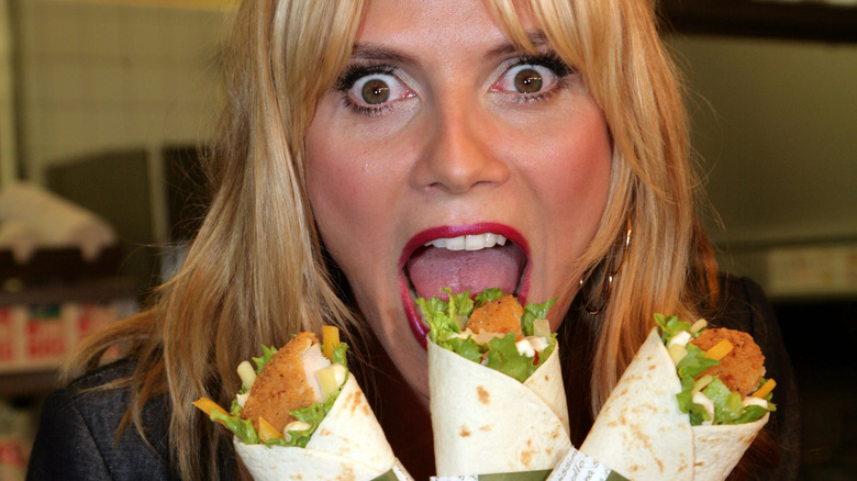 Heidi Klum eating snack wraps