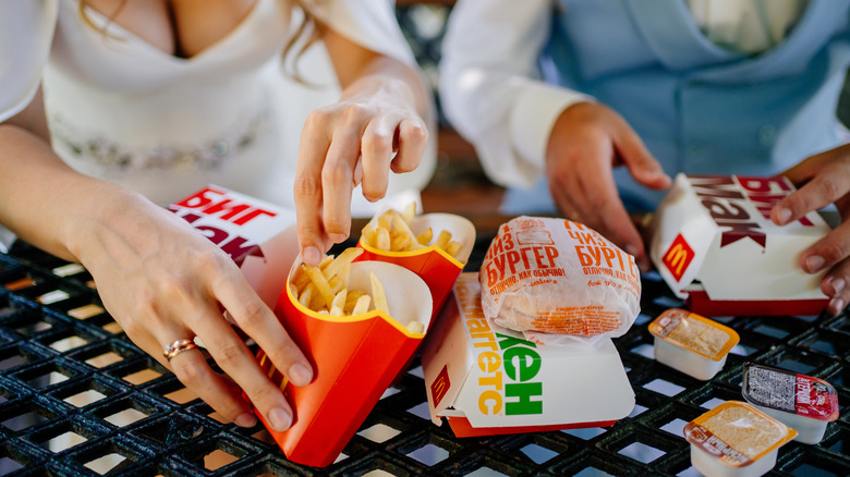 bride and groom eat McDonald's