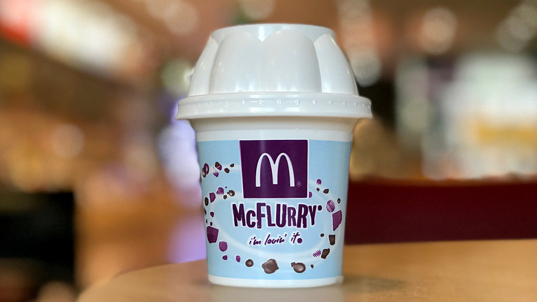 blue McFlurry cup against blurred background
