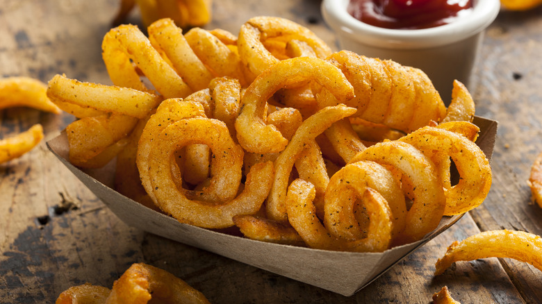 Carton of curly fries