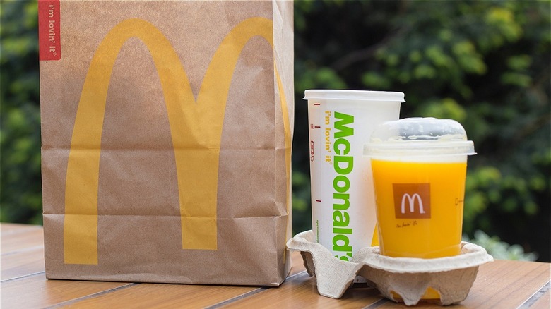 McDonald's paper bag and drinks