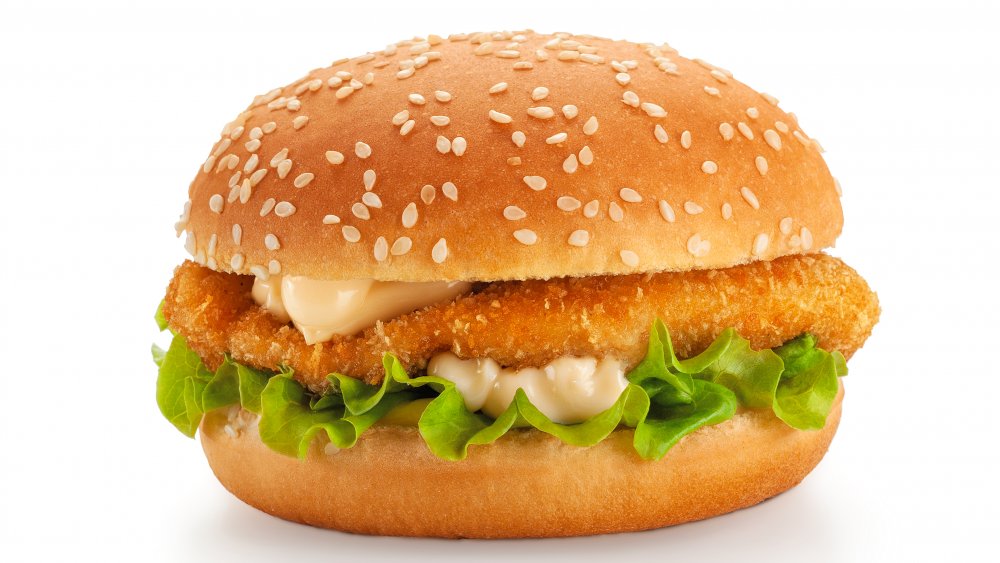 Fried chicken sandwich with lettuce and mayo on sesame seed bun