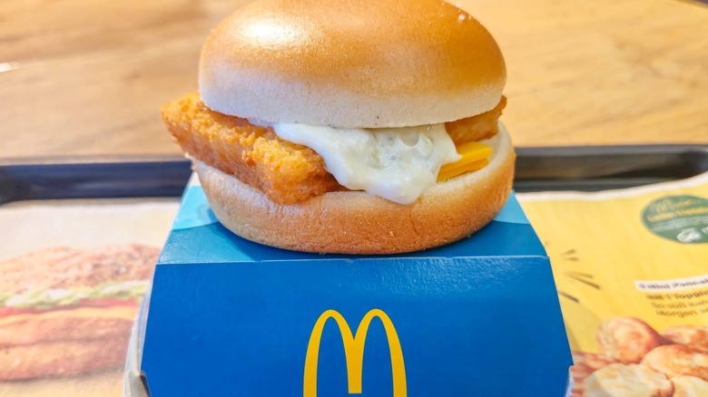 McDonald's Filet-O-Fish on a blue box on a serving tray