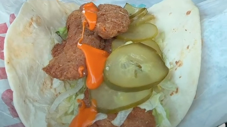 McDonald's snack wrap with extra chicken strips, pickles, and Buffalo dressing