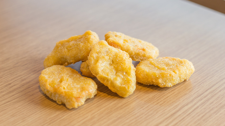 McNuggets on a wooden board