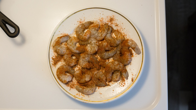 seasoned raw shrimp on plate