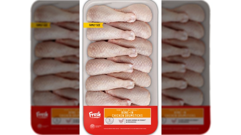 Pack of raw bone-in chicken drumsticks.