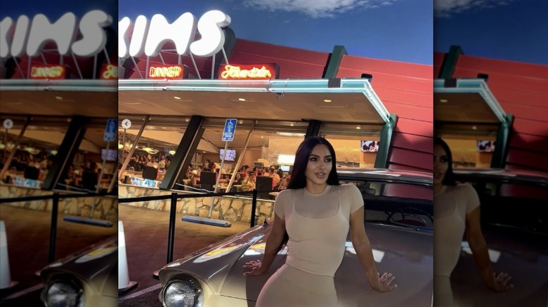 Kim Kardashian posing outside of Mel's Drive-In, West Hollywood