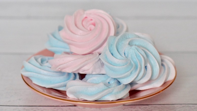 pastel pink and blue meringue cookies