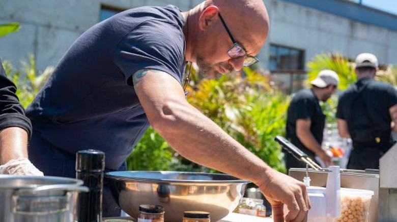 Michael Symon on the set of "Throwdown"