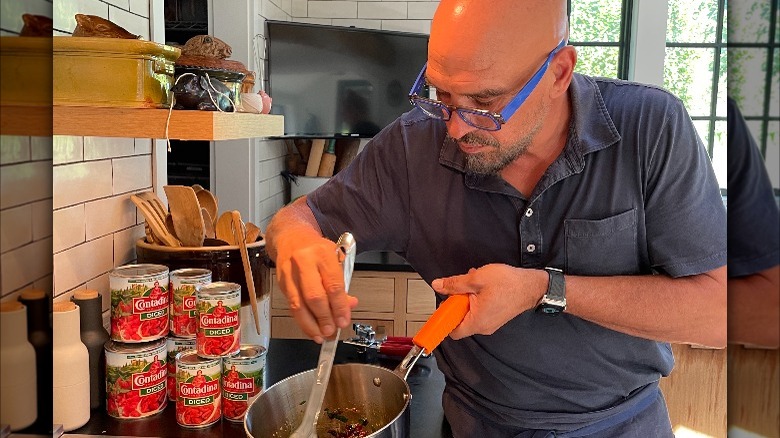 Michaely Symon cooking with canned food