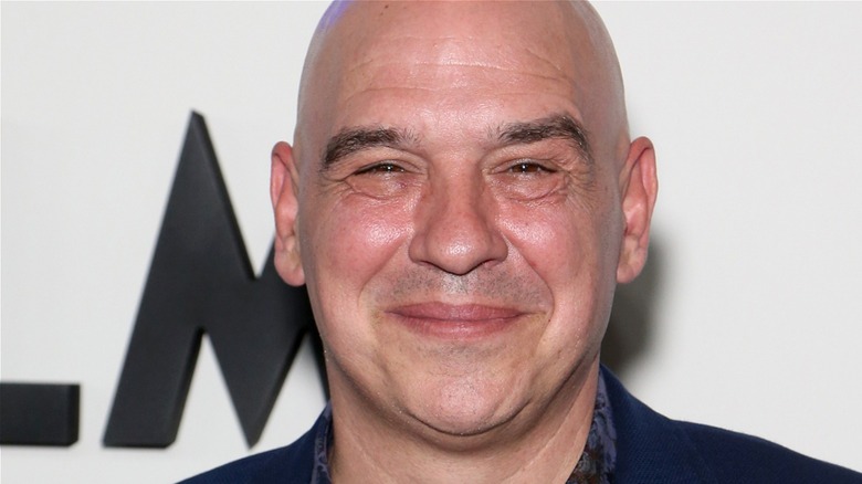 close up of michael symon's face