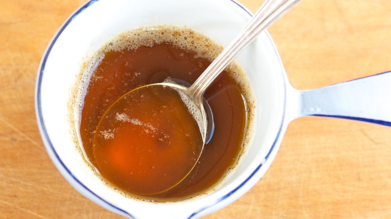 Browned butter in a white pot