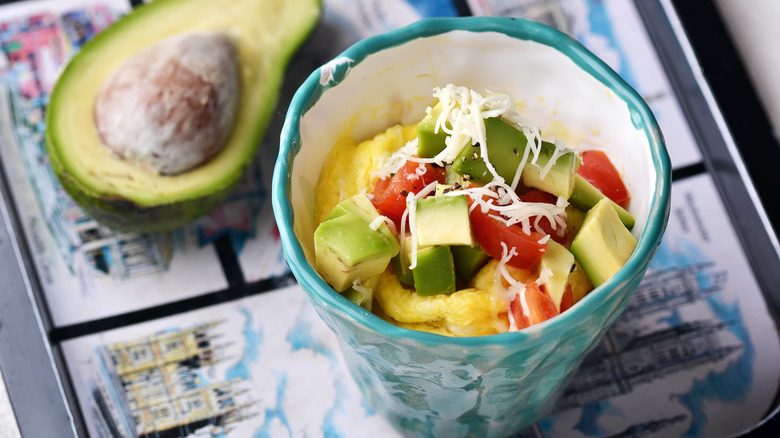 Omelet in a mug with avocado